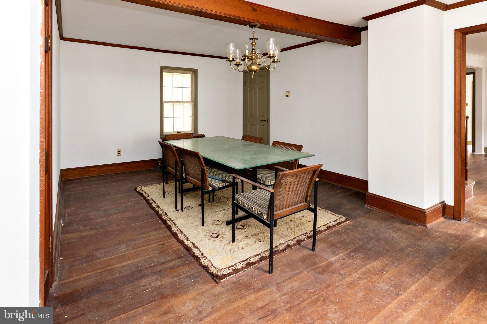 15 Jerome Terrace Clementon, NJ 08021 - Photo 14 of 33 a dining room with a wooden table and chairs