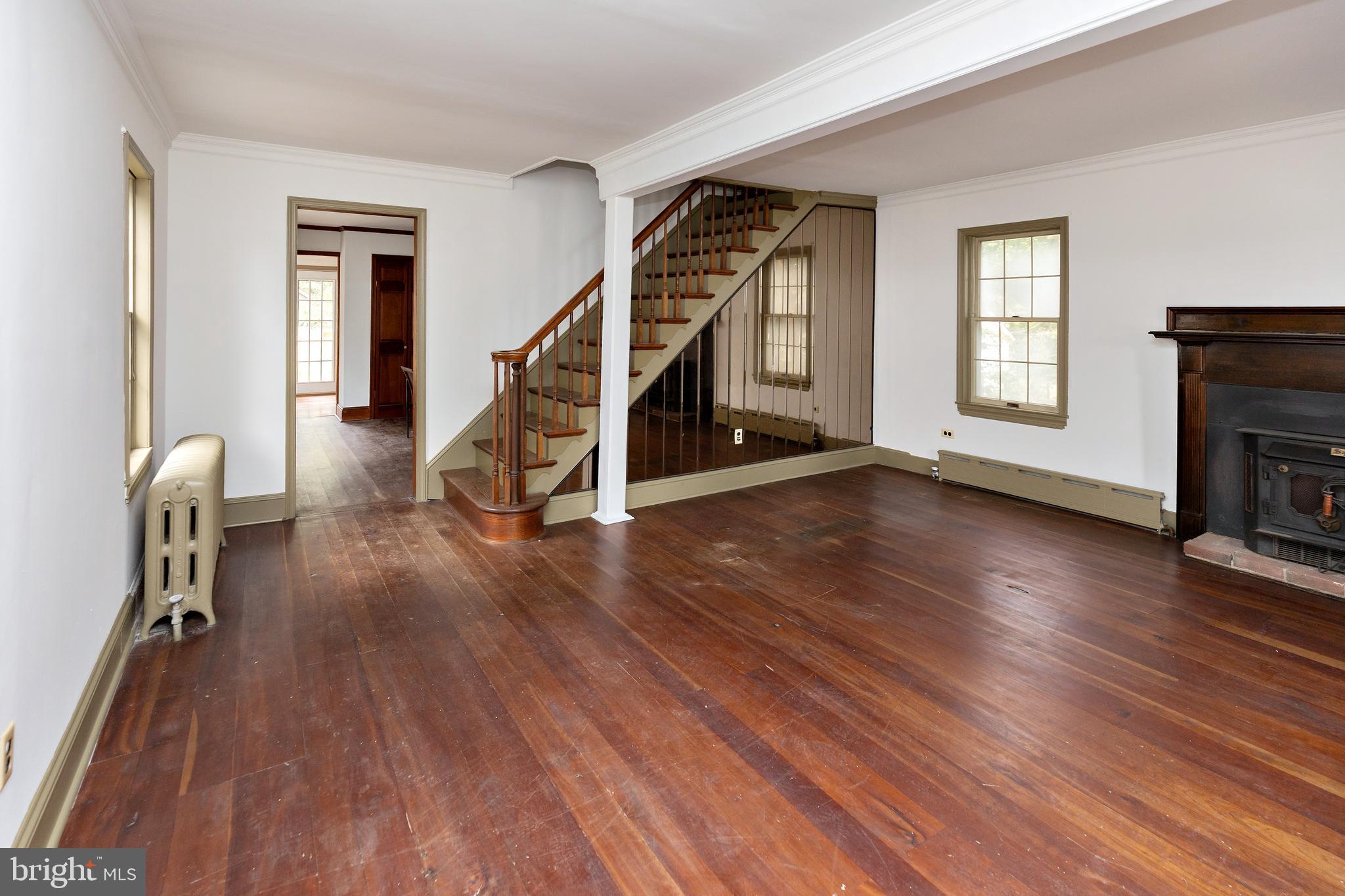 15 Jerome Terrace Clementon, NJ 08021 - Photo 4 of 33 a view of a livingroom with wooden floor and a ceiling fan