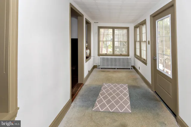 a view of entryway with stairs