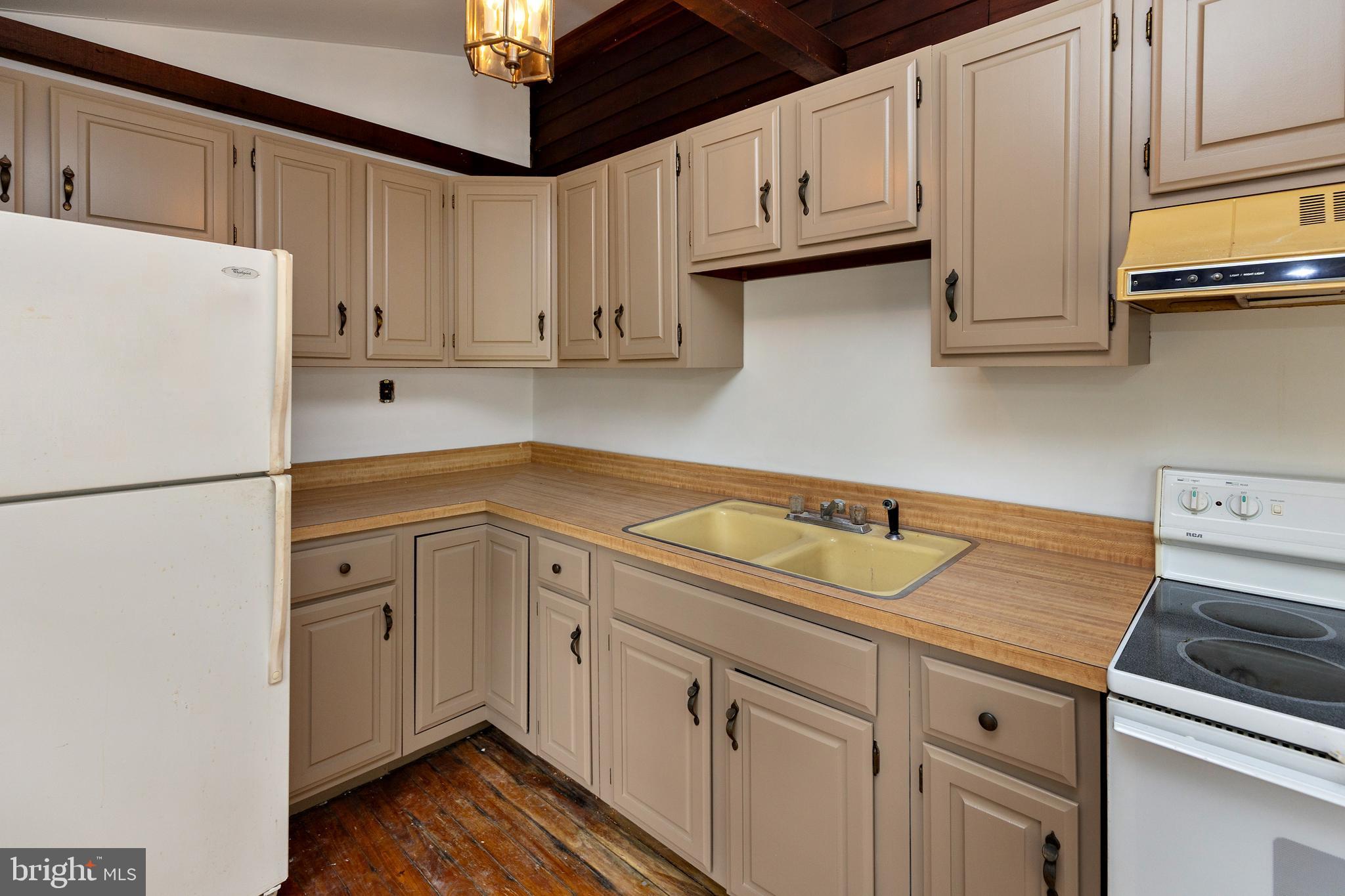15 Jerome Terrace Clementon, NJ 08021 - Photo 10 of 33 a kitchen with stainless steel appliances granite countertop a refrigerator sink and cabinets