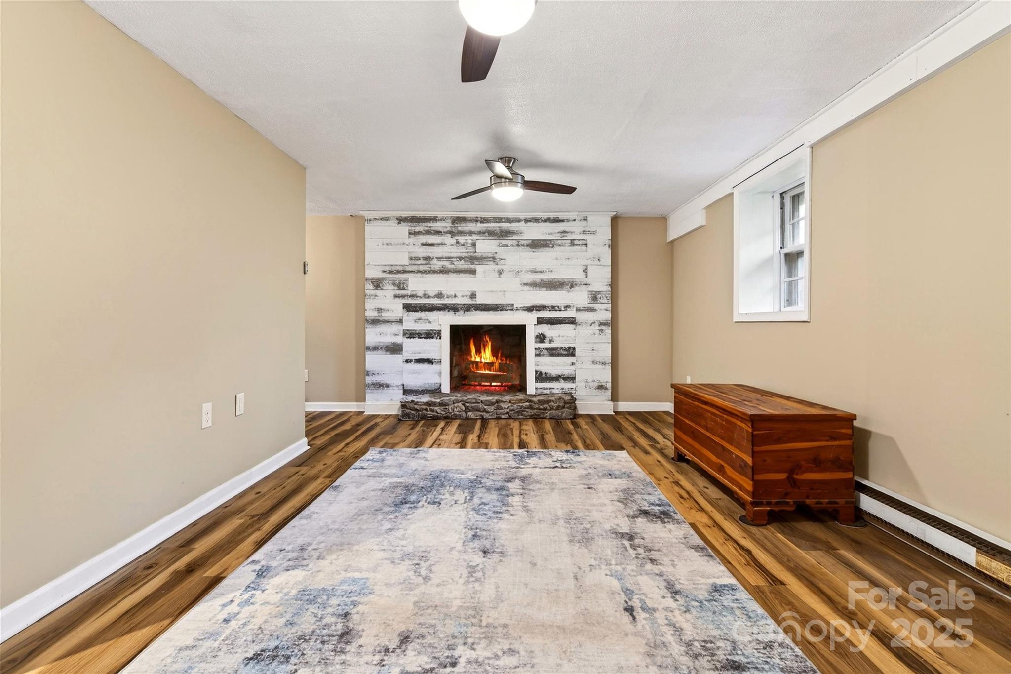 45 Due West Road Hendersonville, NC 28792 - Photo 26 of 45 a living room with furniture fireplace and rug