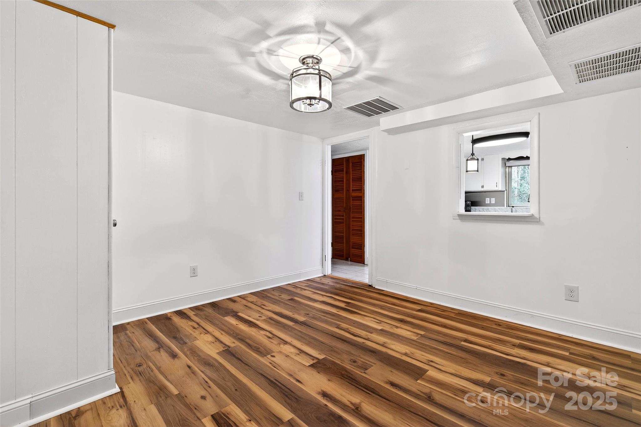 45 Due West Road Hendersonville, NC 28792 - Photo 31 of 45 a view of room with window and ceiling fan