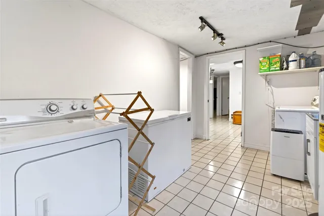 a storage room with washer and dryer
