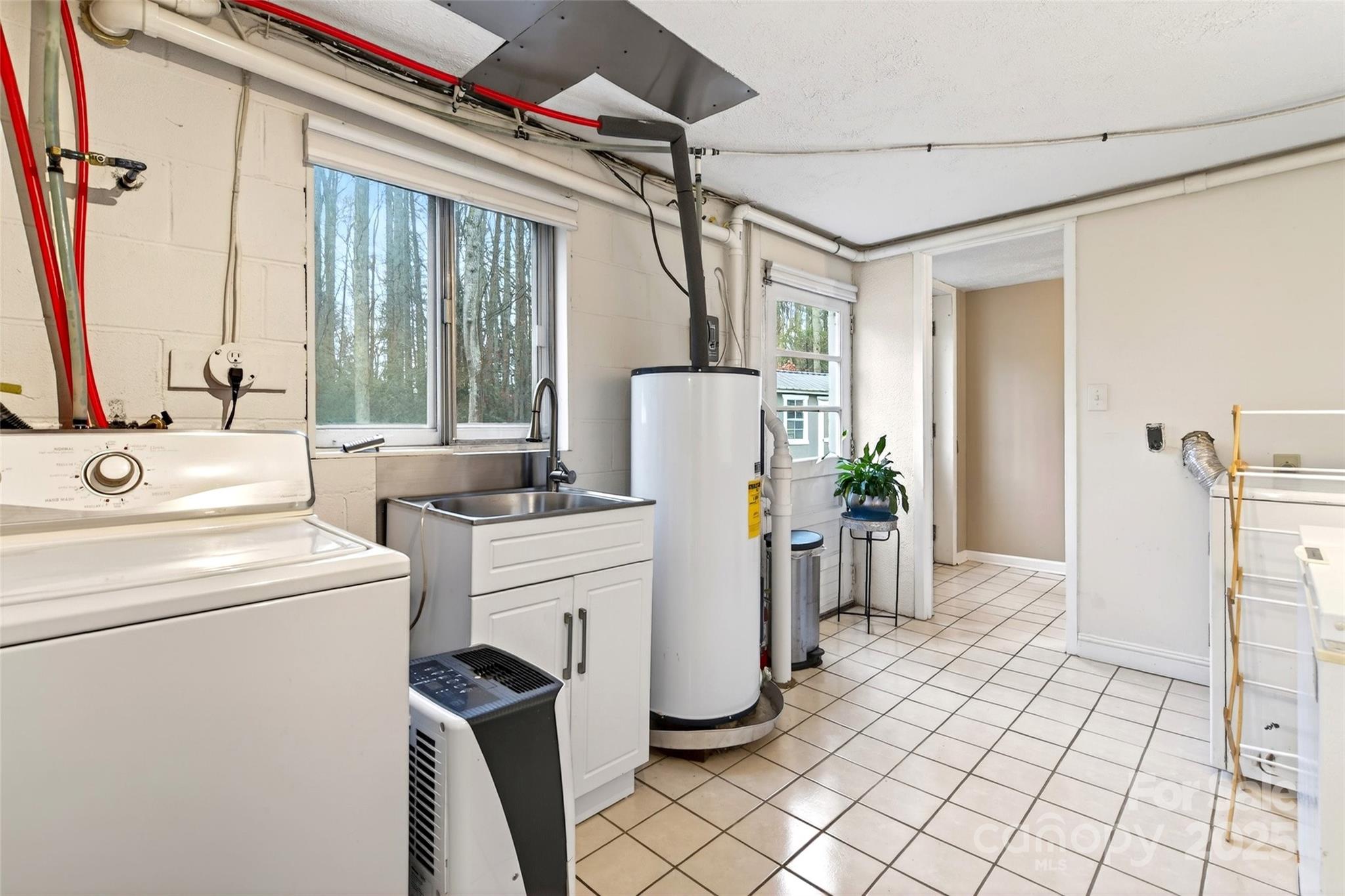 45 Due West Road Hendersonville, NC 28792 - Photo 39 of 45 a utility room with dryer and washer