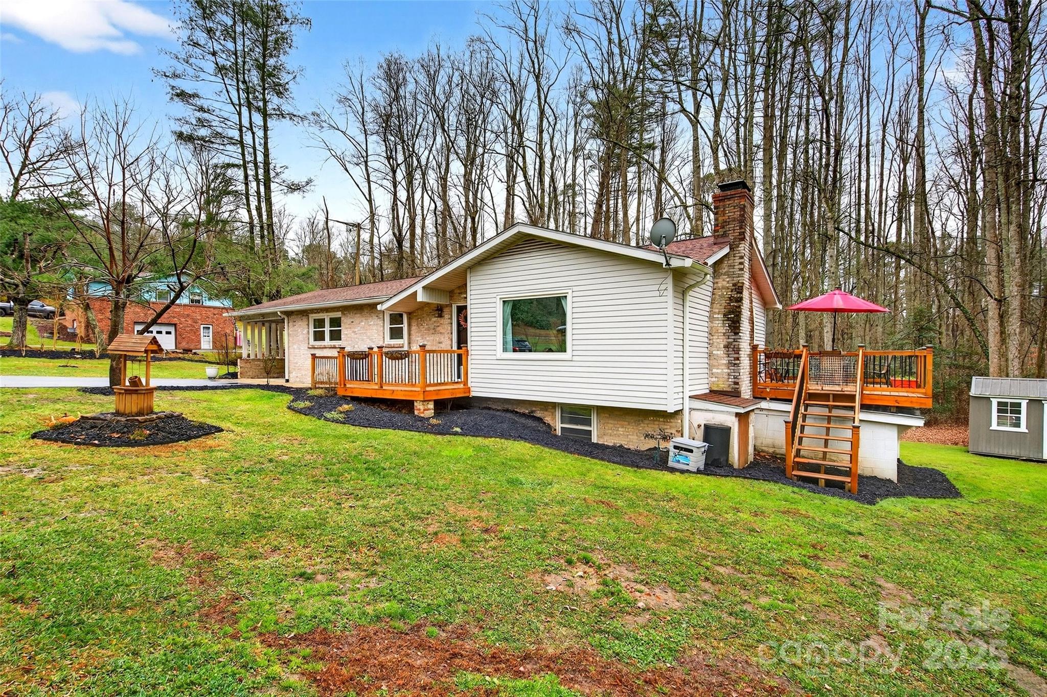 45 Due West Road Hendersonville, NC 28792 - Photo 41 of 45 a front view of a house with garden