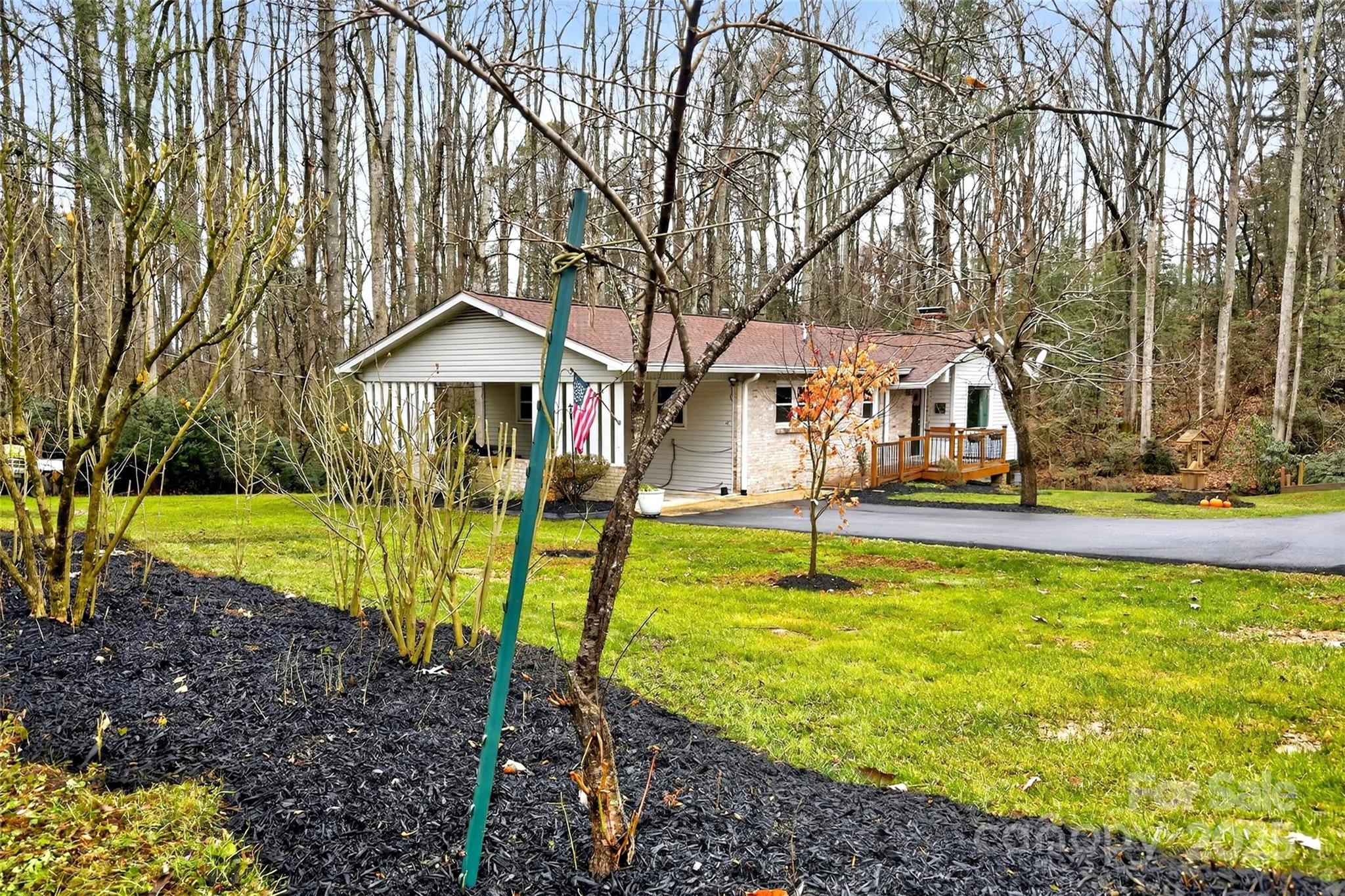 45 Due West Road Hendersonville, NC 28792 - Photo 44 of 45 a view of a house with swimming pool and a yard