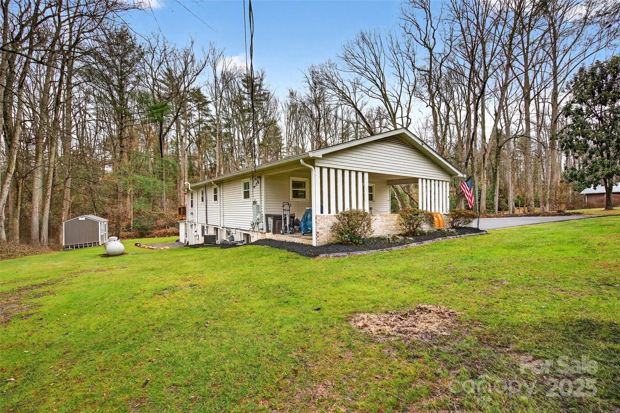 45 Due West Road Hendersonville, NC 28792 - Photo 45 of 45 a front view of a house with yard and green space
