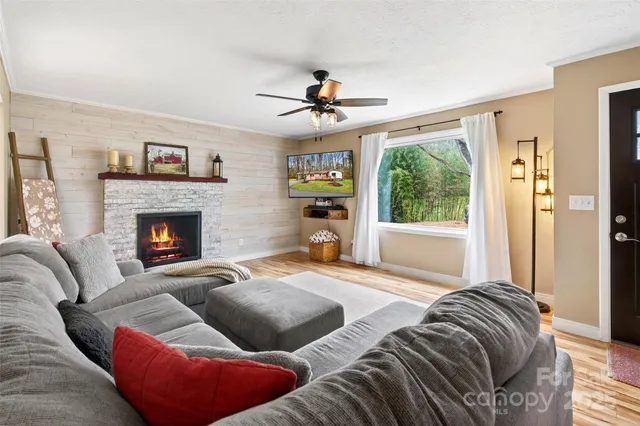 a bedroom with a bed and a fireplace