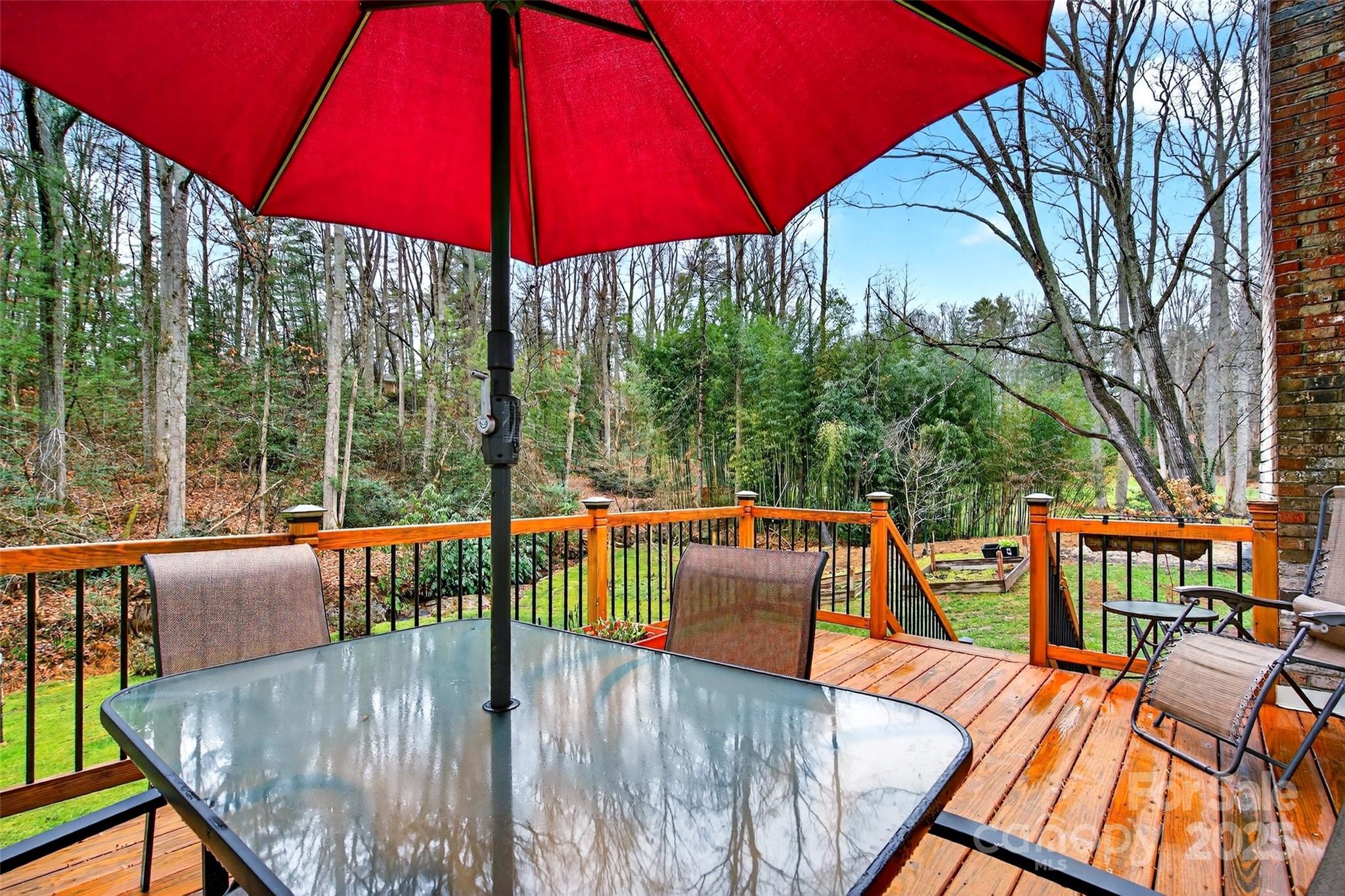 45 Due West Road Hendersonville, NC 28792 - Photo 9 of 45 a view of balcony with wooden floor and outdoor seating