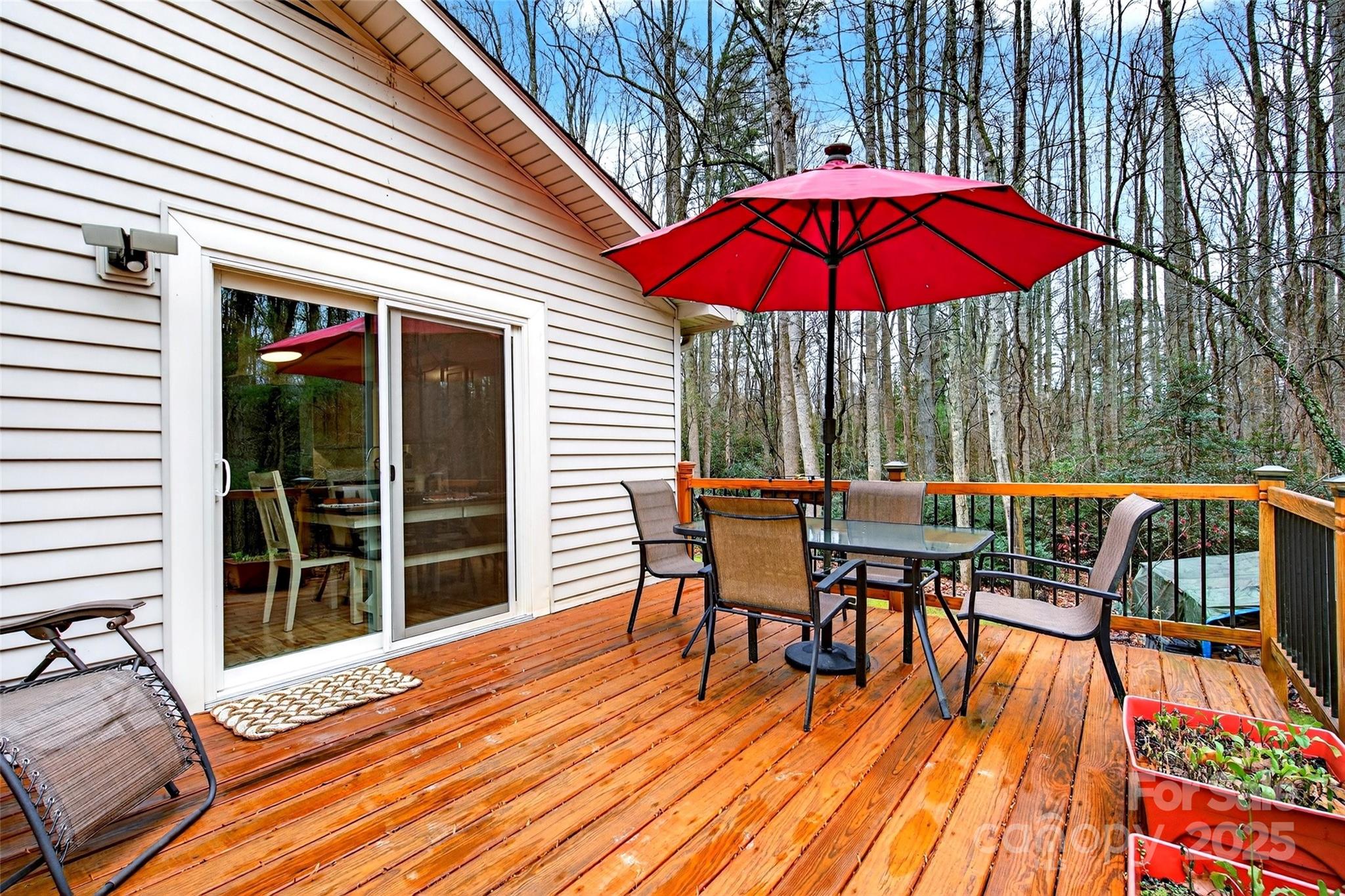 45 Due West Road Hendersonville, NC 28792 - Photo 10 of 45 an outdoor space with furniture and umbrella