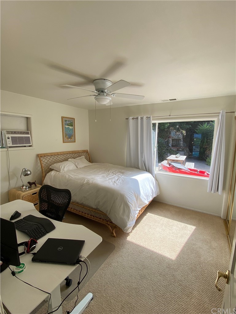 30772 Marilyn Drive Laguna Beach, CA 92651 - Photo 13 of 26 a bedroom with a bed and a window