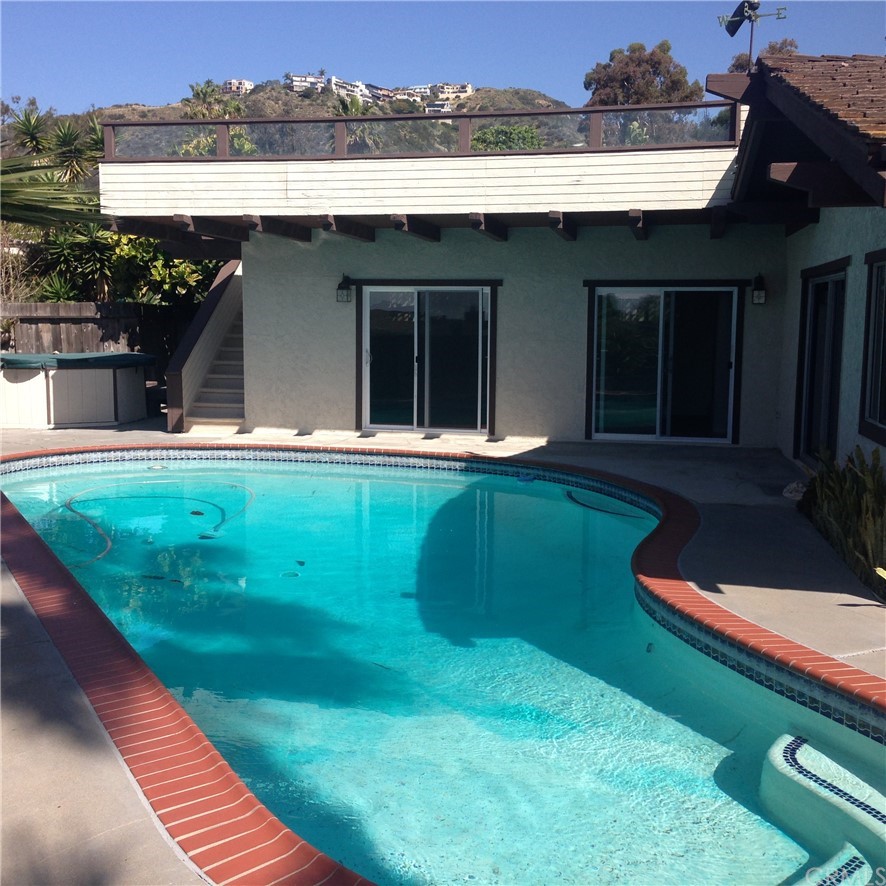 30772 Marilyn Drive Laguna Beach, CA 92651 - Photo 15 of 26 a view of an house with backyard space and a kitchen