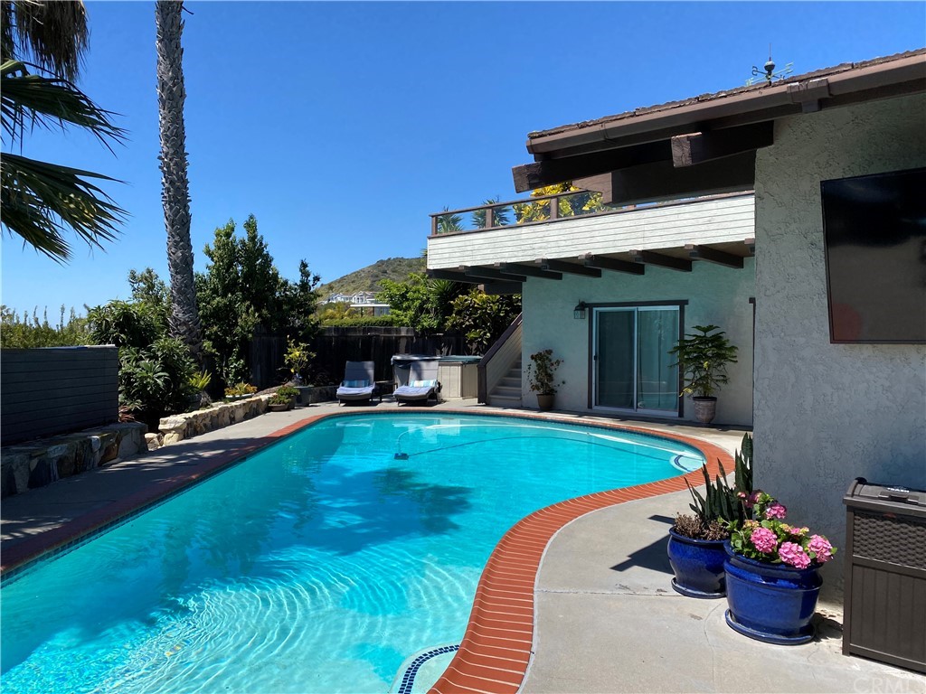 30772 Marilyn Drive Laguna Beach, CA 92651 - Photo 23 of 26 a swimming pool with outdoor seating yard and furniture