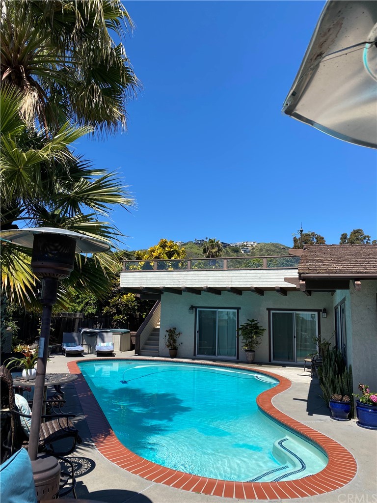 30772 Marilyn Drive Laguna Beach, CA 92651 - Photo 24 of 26 a view of a house with swimming pool and sitting area