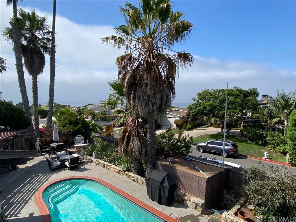 30772 Marilyn Drive Laguna Beach, CA 92651 - Photo 3 of 26 a view of a yard with a table and chairs