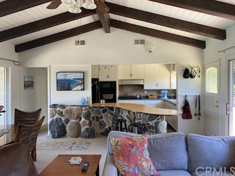30772 Marilyn Drive Laguna Beach, CA 92651 - Photo 7 of 26 a living room with stainless steel appliances kitchen island granite countertop furniture and a view of kitchen