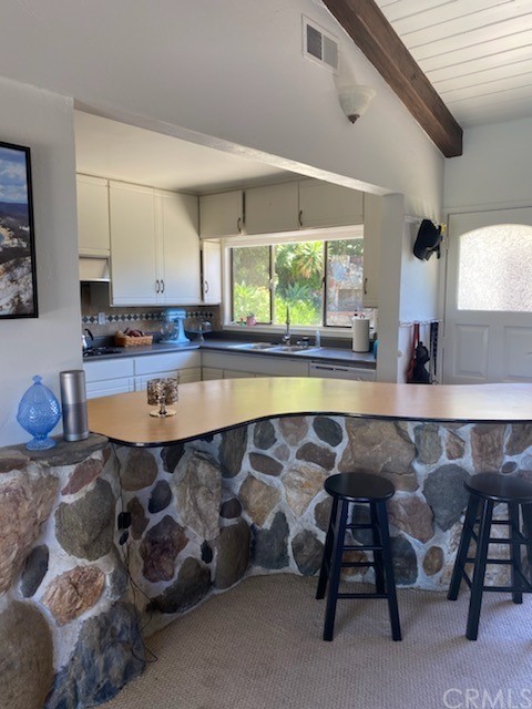 30772 Marilyn Drive Laguna Beach, CA 92651 - Photo 9 of 26 a dining hall with stainless steel appliances granite countertop a stove and a sink