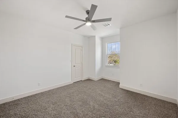 a large white room with a large window