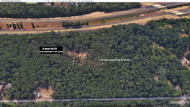 a view of a street with a building in the background
