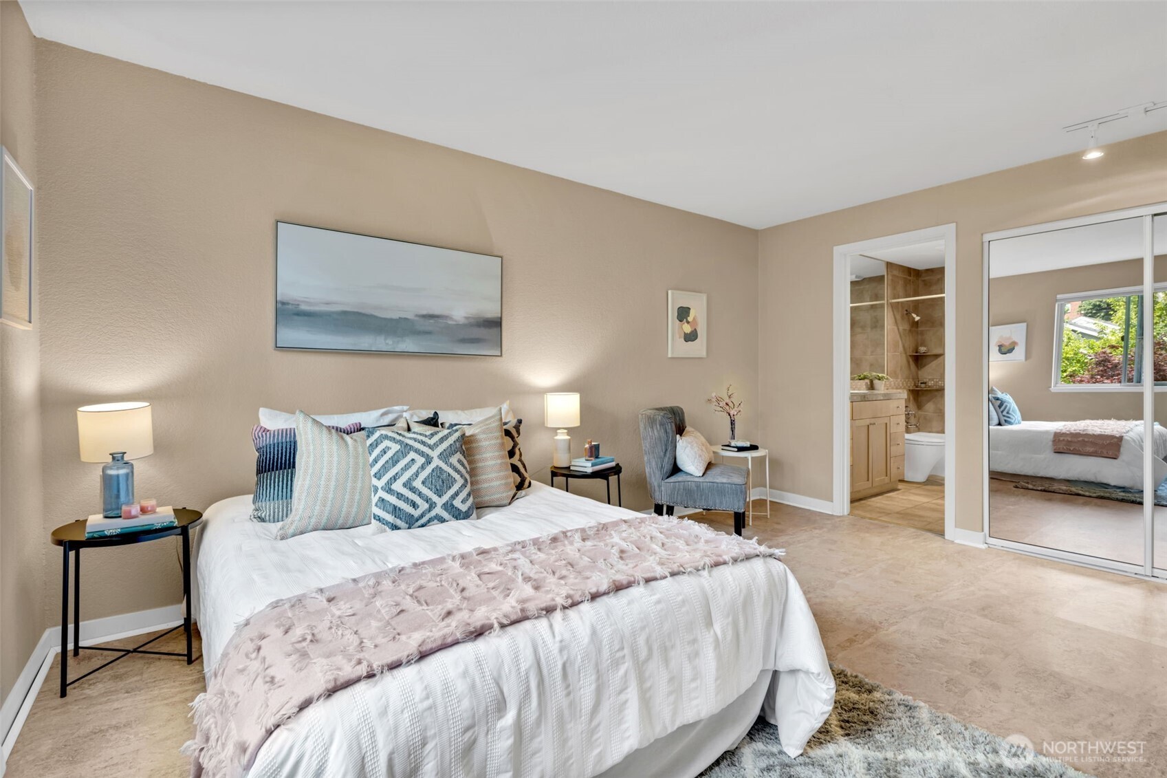 275 West Roy Street, Unit 319 Seattle, WA 98119 - Photo 14 of 30 a bedroom with a bed and a couch