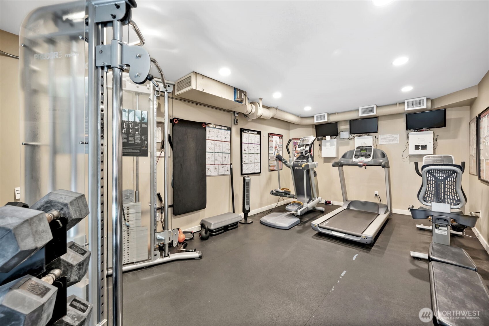 275 West Roy Street, Unit 319 Seattle, WA 98119 - Photo 23 of 30 a view of a room with gym equipment