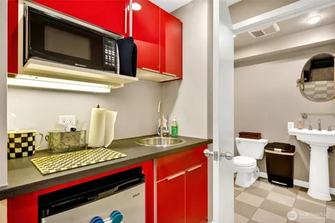 a view of parking garage with cars