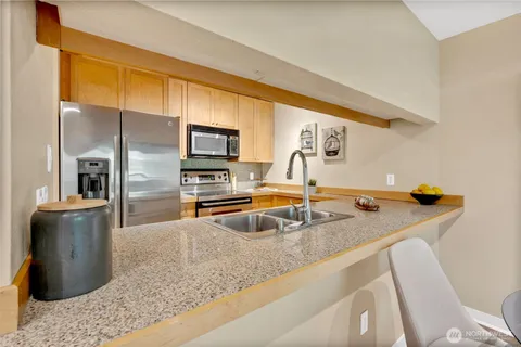 a bedroom with a bed and a couch