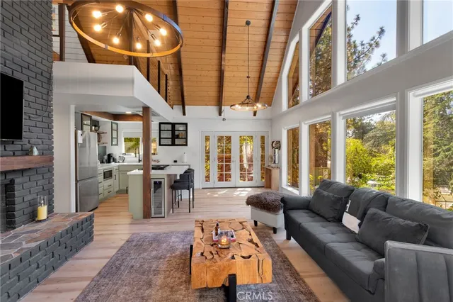 a kitchen with a refrigerator and a sink