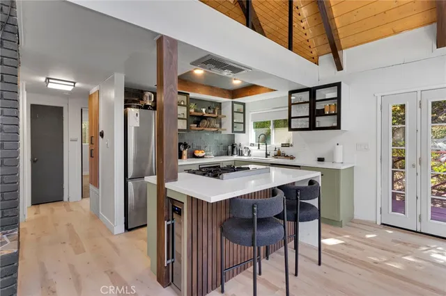 a bedroom with furniture and a window