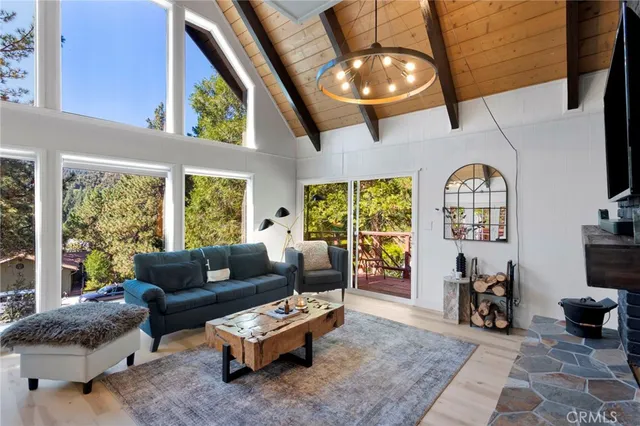 a bathroom with a double vanity sink toilet and shower