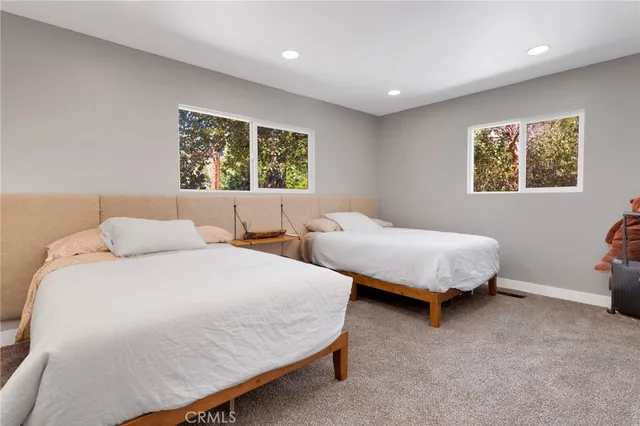 a view of entryway with wooden floor and furniture