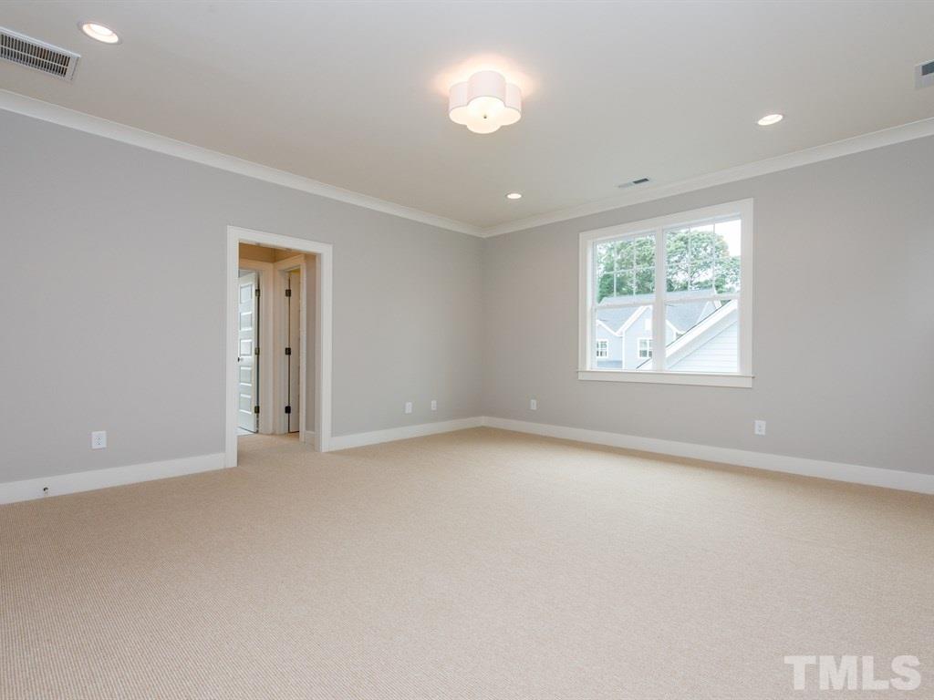 102 Revival Way Raleigh, NC 27608 - Photo 15 of 25 an empty room with a window