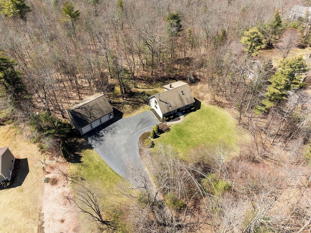 a view of a backyard of the house