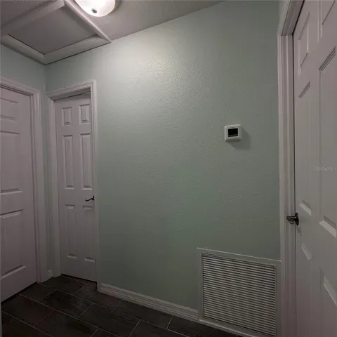 a view of small space with wooden floor