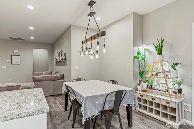 a kitchen that has a cabinets a sink and a stove in it