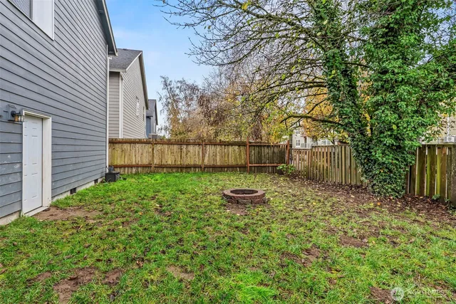 a backyard of a house with lots of green space
