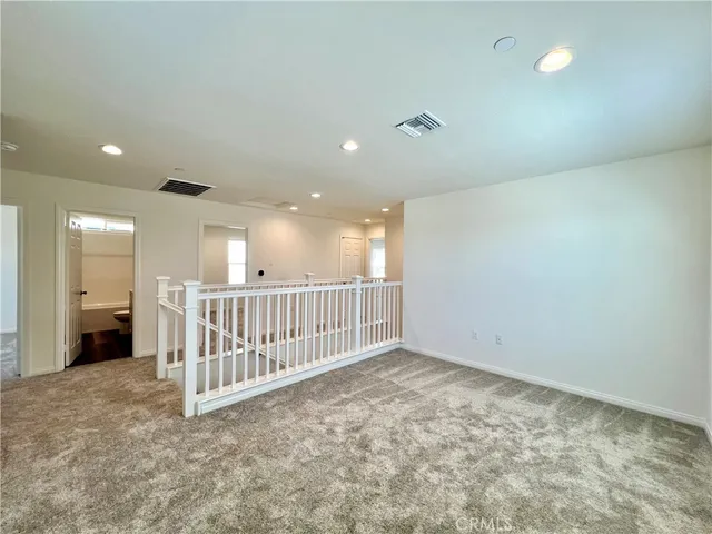 a view of hallway with livingroom