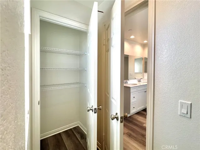 a picture of a bathroom with a shower