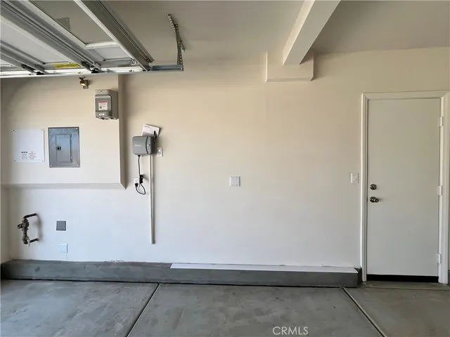 a view of a pathway both side of house