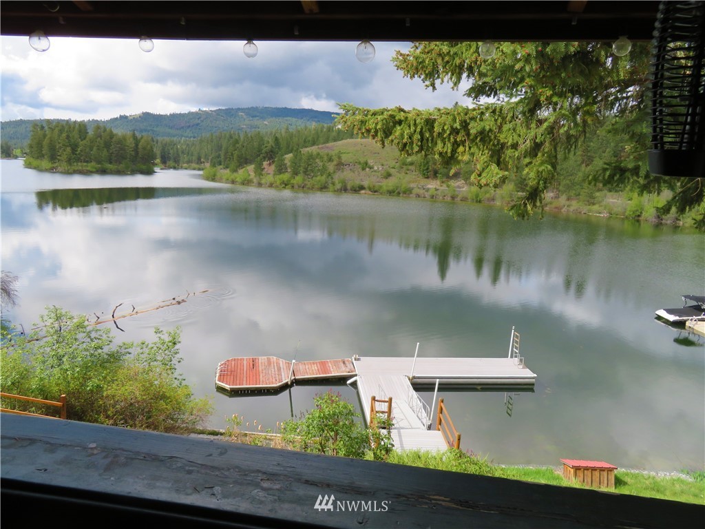 58 Petes Retreat Road Republic, WA 99166 - Photo 12 of 32 a view of a lake with a mountain in the background