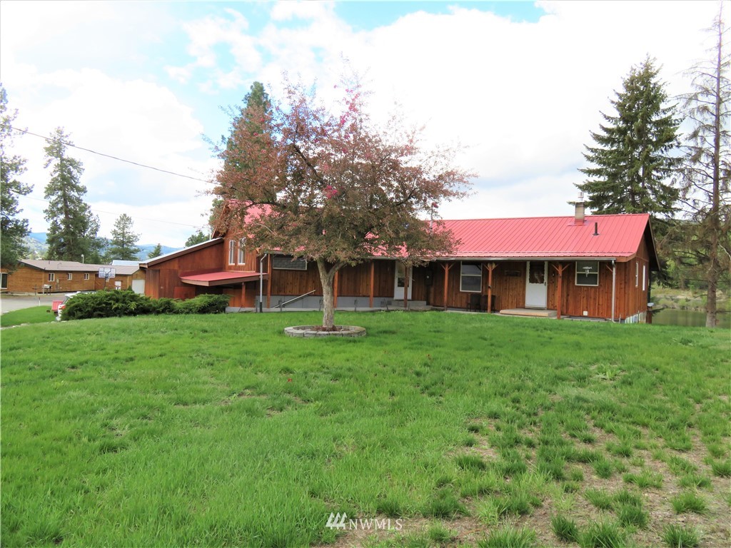 58 Petes Retreat Road Republic, WA 99166 - Photo 30 of 32 a front view of a house with a yard