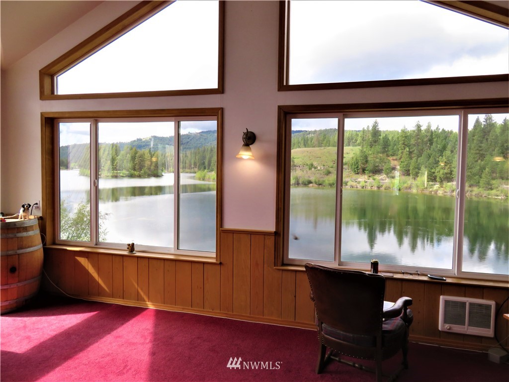58 Petes Retreat Road Republic, WA 99166 - Photo 4 of 32 a living room with large windows