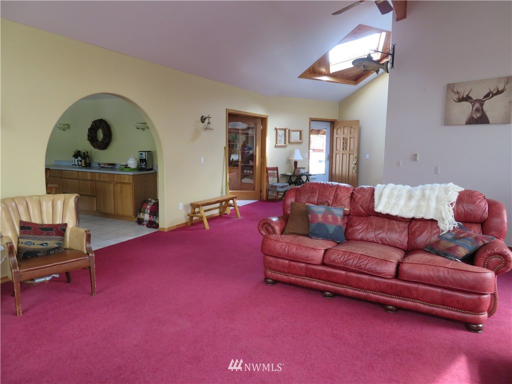 58 Petes Retreat Road Republic, WA 99166 - Photo 5 of 32 a living room with furniture and a wooden floor
