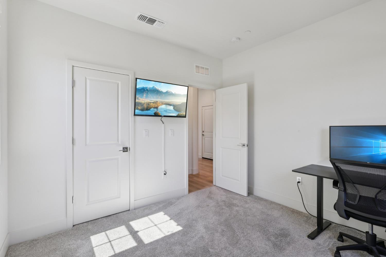 3946 Needham Street Tracy, CA 95377 - Photo 15 of 40 a view of room with workspace and windows
