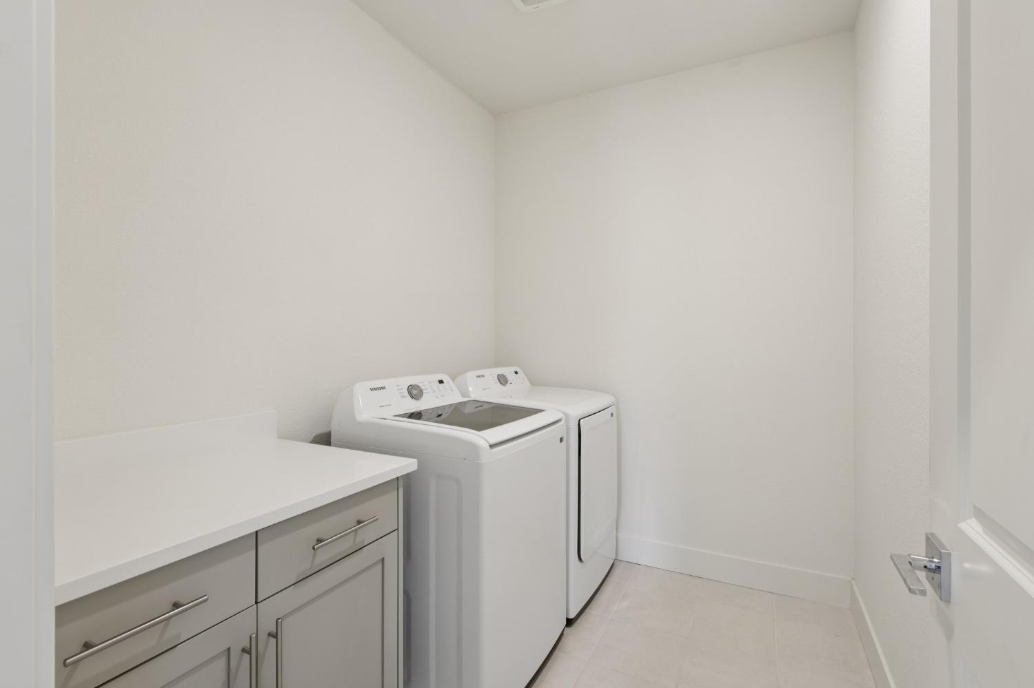 3946 Needham Street Tracy, CA 95377 - Photo 18 of 40 a utility room with dryer and washer