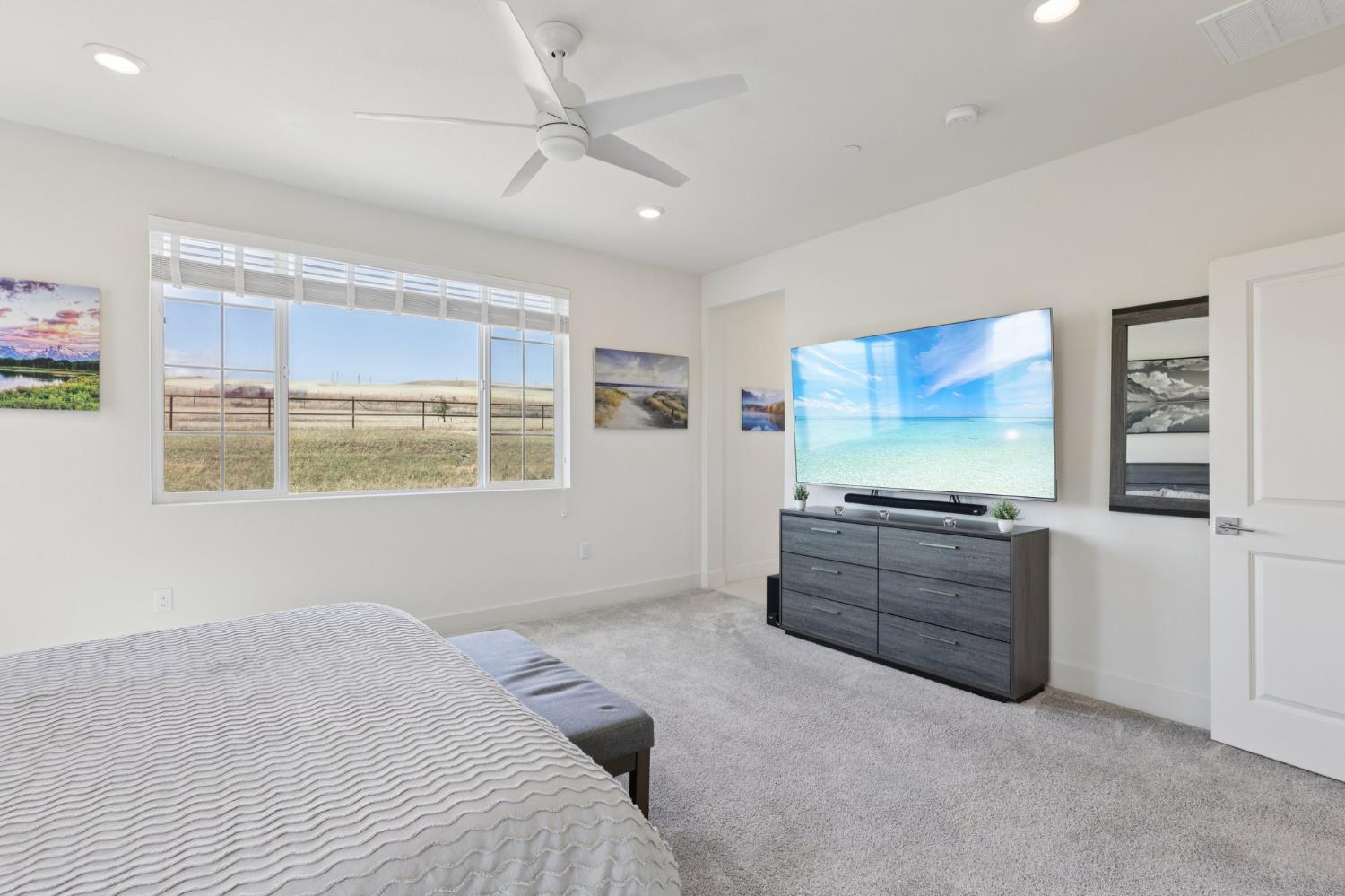 3946 Needham Street Tracy, CA 95377 - Photo 24 of 40 a room with furniture and flat screen tv