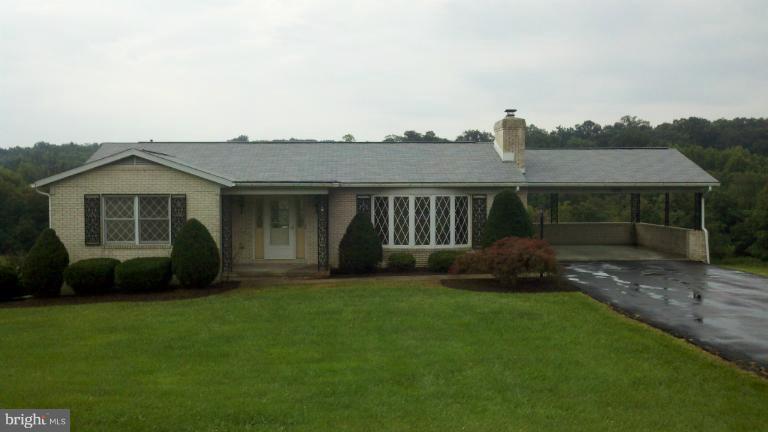 4599 Griffith Road Mount Airy, MD 21771 - Photo 1 of 11 a view of a house with a backyard
