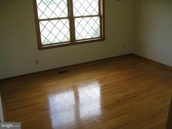 4599 Griffith Road Mount Airy, MD 21771 - Photo 4 of 11 an empty room with a empty space and a window