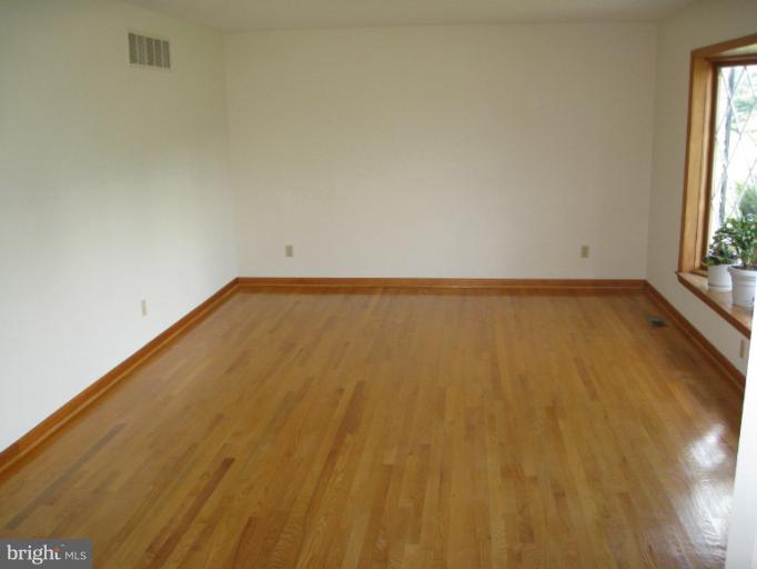 4599 Griffith Road Mount Airy, MD 21771 - Photo 10 of 11 a view of an empty room and a window