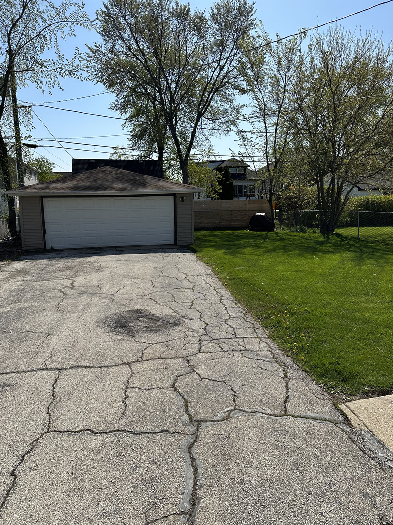 309 Ridgeland Avenue Elmhurst, IL 60126 - Photo 8 of 8 a view of backyard with barbeque grill and trees